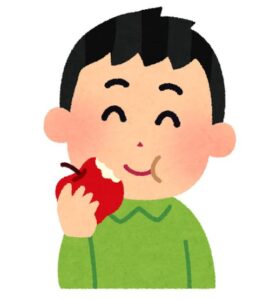 りんごを食べる少年