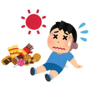 暑さでダウンする男の子とお菓子